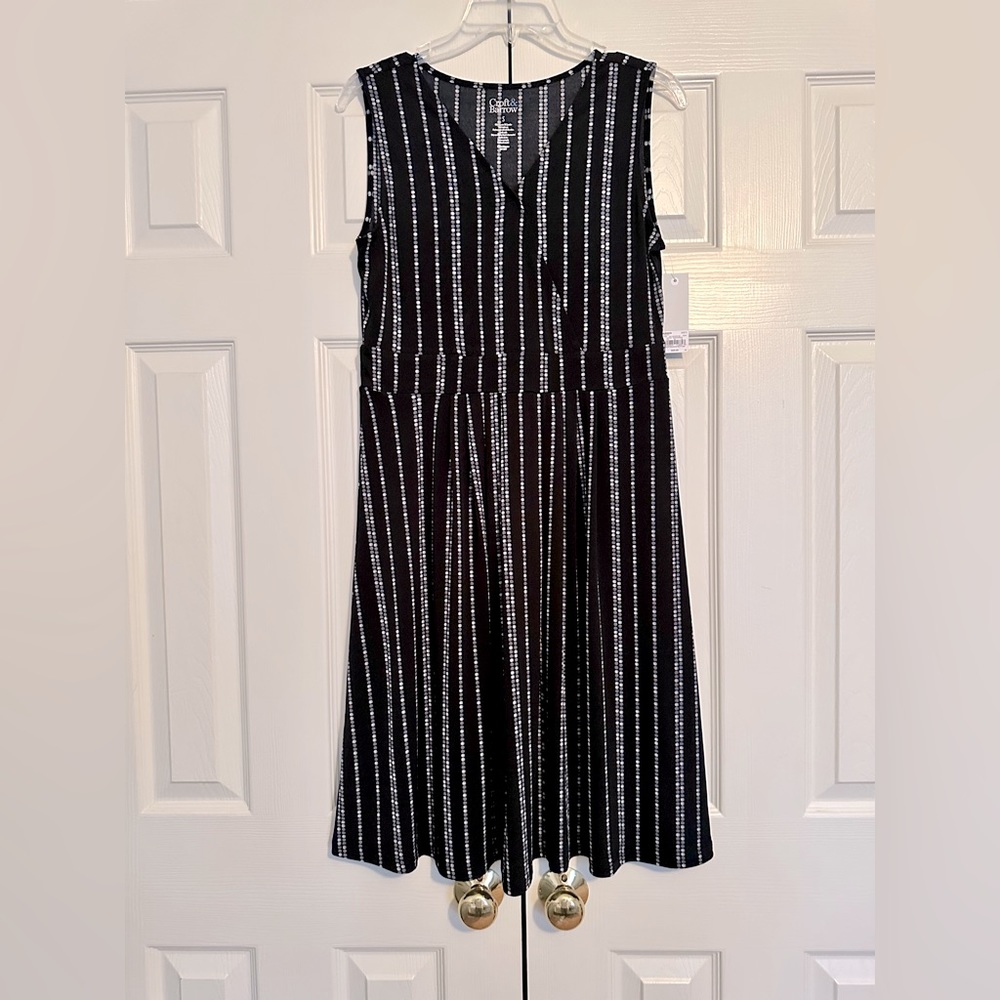 New Black dress with white accents, sleeveless, Size S.